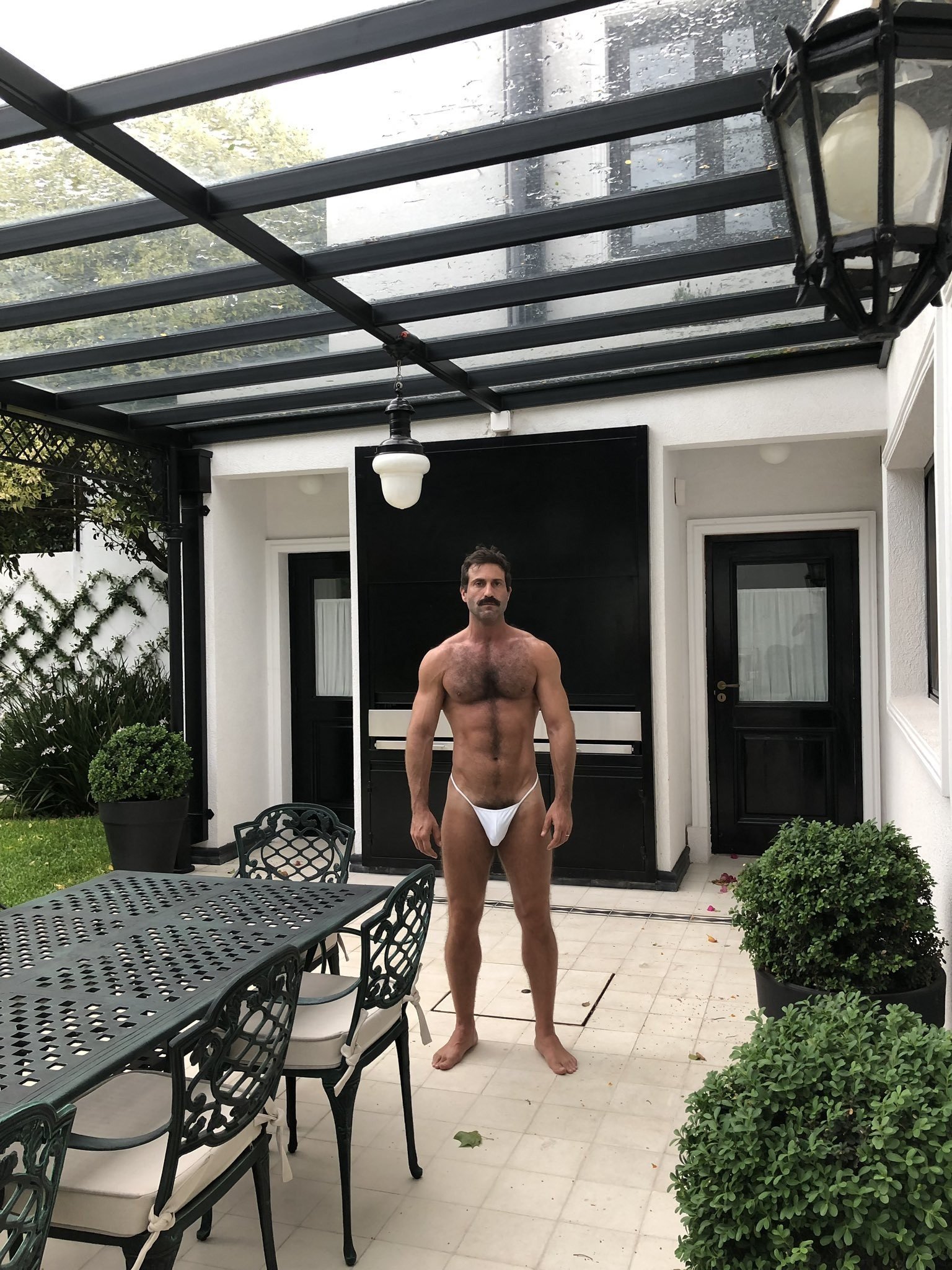 Photo by Nickplus33 with the username @Nickplus33, who is a verified user,  April 20, 2024 at 3:00 AM and the text says '#daddy #hairy #bush #thickbush #outdoors #toned #bulge #stache #band #dilf #series'