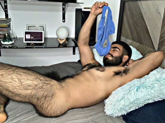 Photo by Nickplus33 with the username @Nickplus33, who is a verified user,  April 29, 2024 at 2:46 AM and the text says '#thickbush #beard #hairy #youngdilf'