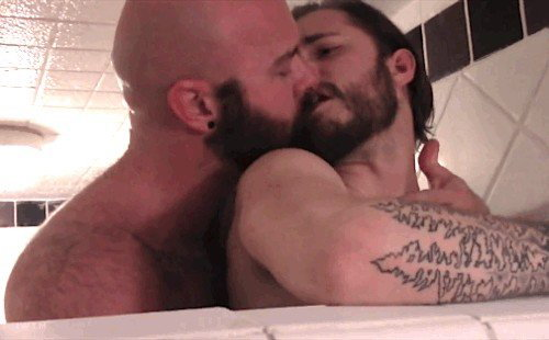 Watch the Photo by Nickplus33 with the username @Nickplus33, who is a verified user, posted on March 13, 2024 and the text says '#gif #kissing #bromance #bald #beard #ink #dilf'