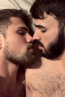 Photo by Nickplus33 with the username @Nickplus33, who is a verified user,  March 23, 2024 at 5:24 AM and the text says '#gif #kissing #otter  #beard #hairy #bromance'