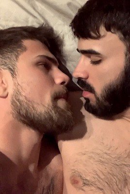 Photo by Nickplus33 with the username @Nickplus33, who is a verified user,  April 26, 2024 at 2:11 AM and the text says '#bromance #kissing #beard #hairy #gif #otter'