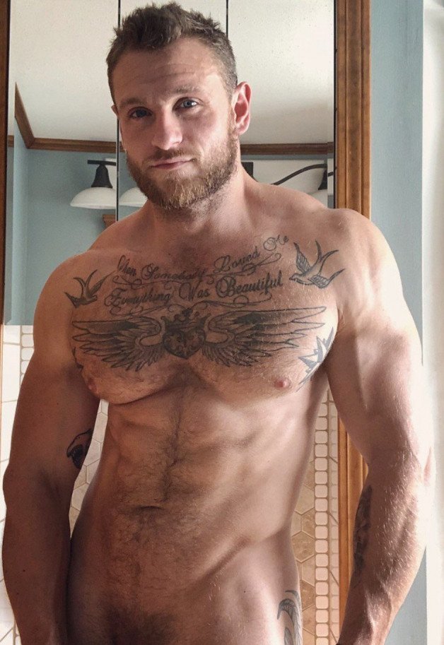 Photo by Nickplus33 with the username @Nickplus33, who is a verified user,  April 30, 2024 at 12:59 AM and the text says '#beard #hairy #dilf #muscled #hairychest #ink #bush #youngdilf'