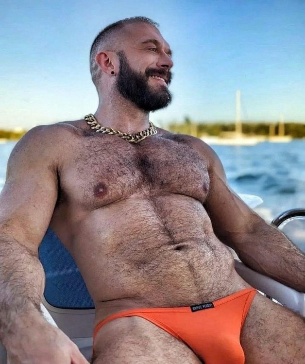 Photo by Nickplus33 with the username @Nickplus33, who is a verified user,  April 26, 2024 at 1:53 AM and the text says '#chain #beard #hairy #beefy #bulge #muscled #daddy #dilf #outdoors'