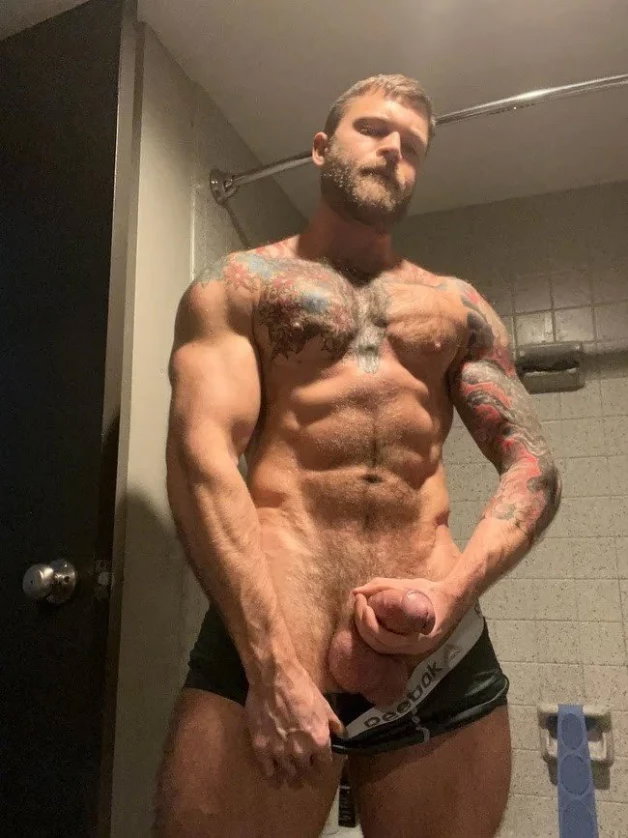 Photo by Nickplus33 with the username @Nickplus33, who is a verified user,  May 11, 2024 at 3:55 AM and the text says '#beard #blondes #dilf #muscled #ink  #hairy #hairychest #fatcock #thickdick #massivecock #hung #trimmed  #bush'