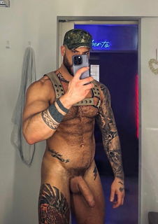 Photo by Nickplus33 with the username @Nickplus33, who is a verified user,  July 3, 2024 at 2:02 AM and the text says '#harness #leather #dilf #muscled #hairy #trimmed  #ink #hung #longdick #schlong  #uncut  #massivecock #caps'