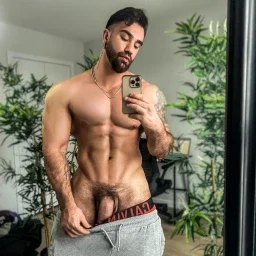 Photo by Nickplus33 with the username @Nickplus33, who is a verified user,  March 16, 2024 at 4:27 AM and the text says '#otter  #muscled #smooth #thickdick #hung #massivecock #fatcock #trimmed  #chain #beard'