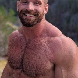 Photo by Nickplus33 with the username @Nickplus33, who is a verified user,  April 28, 2024 at 2:56 AM and the text says '#muscled #hairy #hairychest #beard #dilf #outdoors'