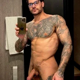 Photo by Nickplus33 with the username @Nickplus33, who is a verified user,  May 4, 2024 at 3:35 AM and the text says '#muscled #selfie #dilf #specs #hung #fatcock #trimmed #uncut'