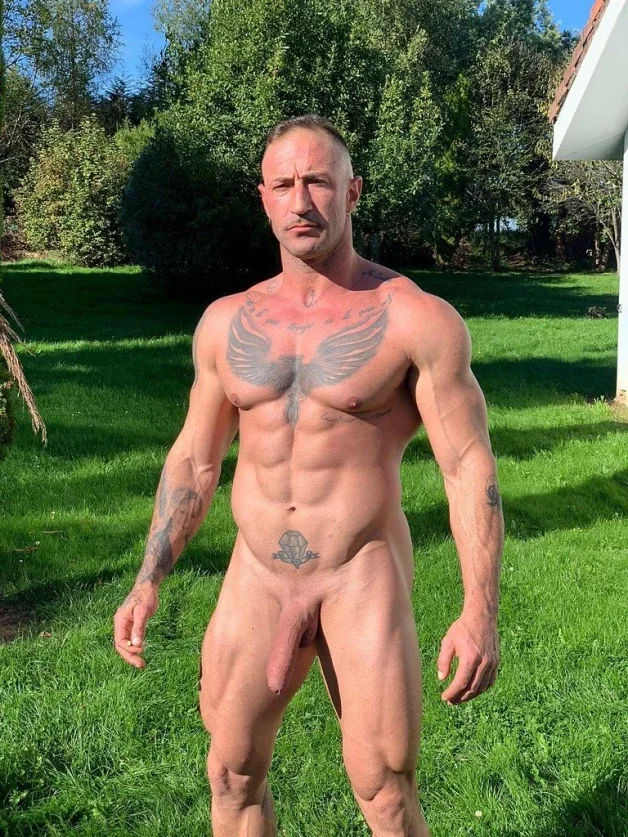 Photo by Nickplus33 with the username @Nickplus33, who is a verified user,  April 5, 2024 at 2:11 AM and the text says '#dilf #outdoors #muscled #hung #ink #uncut  #massivecock #smooth #trimmed  #longdick #schlong'