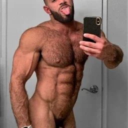Photo by Nickplus33 with the username @Nickplus33, who is a verified user,  May 13, 2024 at 4:55 AM and the text says '#selfie #muscled #youngdilf #beard #hairy #hairychest #thickdick #hung #bush #tongue'