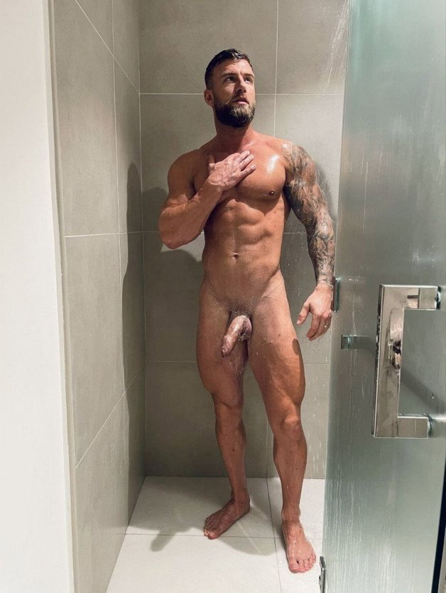Photo by Nickplus33 with the username @Nickplus33, who is a verified user,  March 14, 2024 at 2:40 AM and the text says '#muscled #hung #thickdick #uncut  #schlong  #blondes #beard #youngdilf #obsession #mattygilbert #shower #smooth #ink'