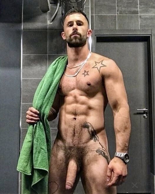 Photo by Nickplus33 with the username @Nickplus33, who is a verified user,  May 3, 2024 at 3:15 AM and the text says '#muscled #ink #chain #hung #thickdick #trimmed  #shower #youngdilf #beard #massivecock'
