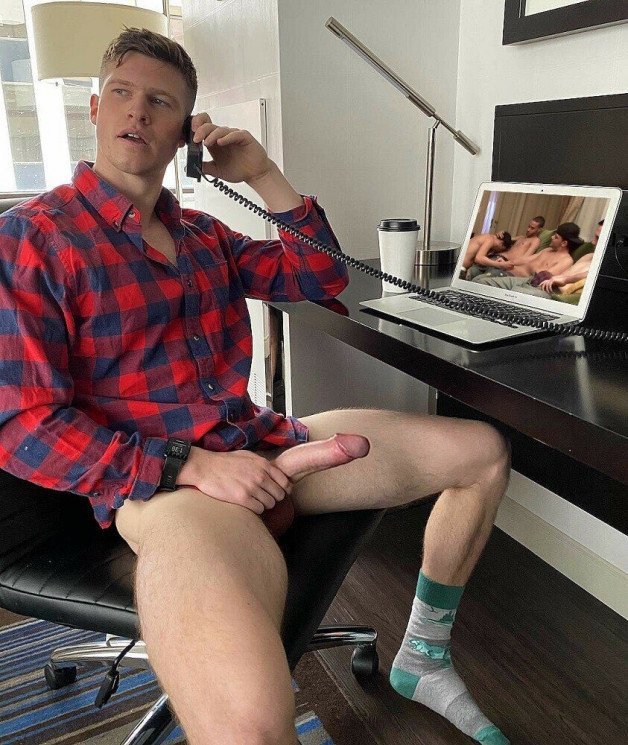 Photo by Nickplus33 with the username @Nickplus33, who is a verified user,  March 11, 2024 at 3:07 AM and the text says '#blondes #hung #massivecock #stud #homeoffice #manspread'