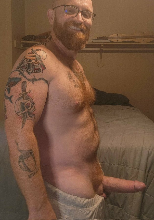 Photo by Nickplus33 with the username @Nickplus33, who is a verified user,  January 18, 2024 at 7:28 AM and the text says '#beefy #daddy #ginger  #hung #thickdick #massivecock #bush #hairy #specs #ink #monstercock #reveal'