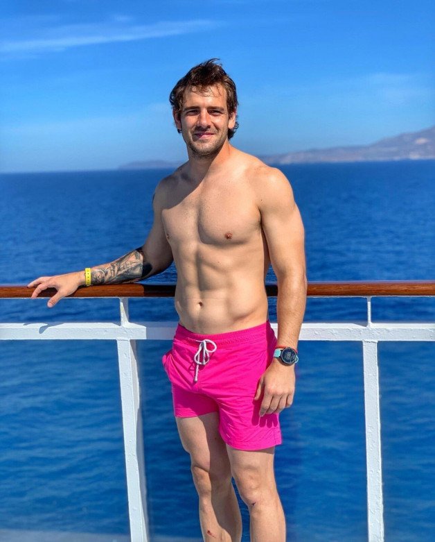 Photo by Nickplus33 with the username @Nickplus33, who is a verified user,  May 15, 2024 at 5:00 AM and the text says '#outdoors #stud #muscled #smooth #toned #otter  #beard #pink #trunks'