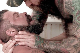 Photo by Nickplus33 with the username @Nickplus33, who is a verified user,  June 14, 2024 at 2:30 AM and the text says '#gif #cumkiss #cumswapp #beard #daddy #bear #hairy #ink #caps #cum #hotAF #cummybeard'