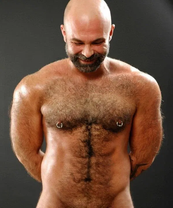 Photo by Nickplus33 with the username @Nickplus33, who is a verified user,  May 7, 2024 at 6:00 AM and the text says '#hairy #daddy #beard #toned #bald #happytrail'