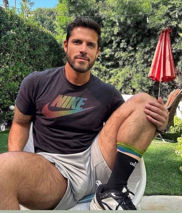Photo by Nickplus33 with the username @Nickplus33, who is a verified user,  June 16, 2024 at 2:38 AM and the text says '#manspread  #youngdilf #bulge #beard #outdoors'