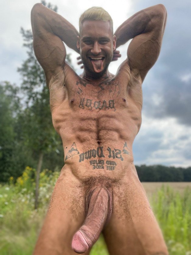 Photo by Nickplus33 with the username @Nickplus33, who is a verified user,  August 28, 2023 at 6:40 AM and the text says '#hairy #ink #youngdilf #hung #schlong #monstercock #donkeydick #tongue'