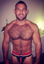 Photo by Nickplus33 with the username @Nickplus33, who is a verified user,  October 15, 2023 at 3:36 AM and the text says '#toned #youngdilf #hairy #beard #scruff #muscled'