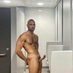Photo by Nickplus33 with the username @Nickplus33, who is a verified user,  September 25, 2023 at 3:11 AM and the text says '#bald #toned #hairy #youngdilf #beard #scruff #wc #restroom #cruising'
