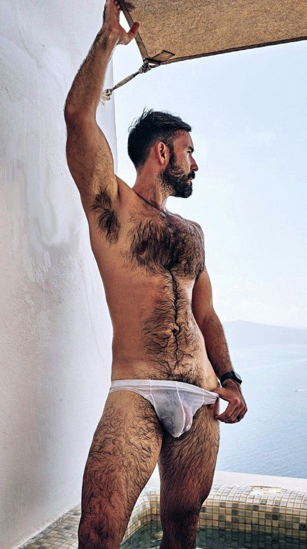 Photo by Nickplus33 with the username @Nickplus33, who is a verified user,  June 19, 2024 at 1:59 AM and the text says '#hairy #bulge #dilf #hairychest #toned #beard'