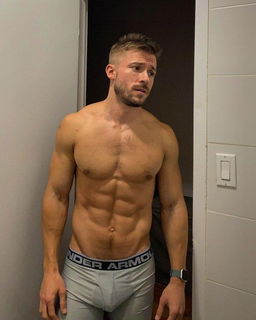 Photo by Nickplus33 with the username @Nickplus33, who is a verified user,  September 25, 2023 at 3:08 AM and the text says '#toned #youngdilf #beard #ripped'