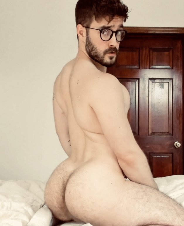 Photo by Nickplus33 with the username @Nickplus33, who is a verified user,  July 13, 2024 at 2:06 AM and the text says '#butt #beard #Forest #obsession #specs  #otter'