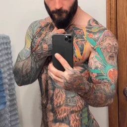 Photo by Nickplus33 with the username @Nickplus33, who is a verified user,  May 4, 2024 at 3:30 AM and the text says '#beard #selfie #youngdilf #ink #toned #hairy #spear #otter'