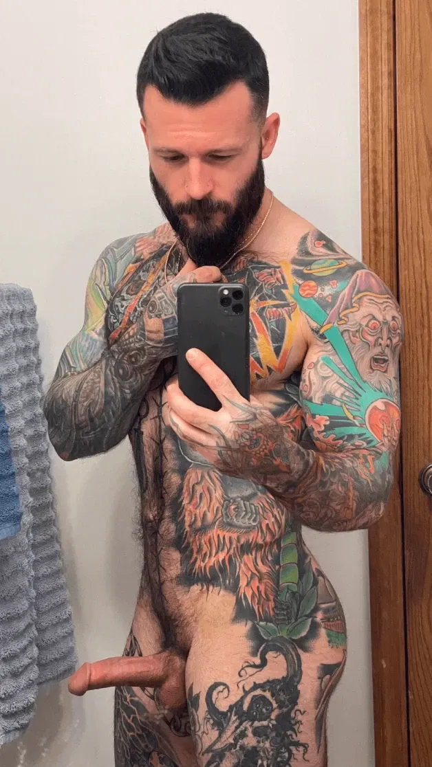 Photo by Nickplus33 with the username @Nickplus33, who is a verified user,  May 4, 2024 at 3:30 AM and the text says '#beard #selfie #youngdilf #ink #toned #hairy #spear #otter'