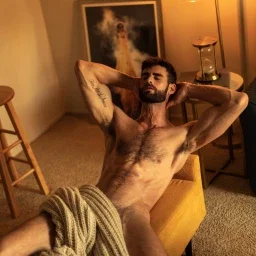 Photo by Nickplus33 with the username @Nickplus33, who is a verified user,  May 3, 2024 at 3:15 AM and the text says '#hairy #toned #beard #hairychest #muscled #youngdilf #dilf'