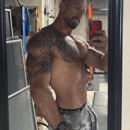 Photo by Nickplus33 with the username @Nickplus33, who is a verified user,  April 21, 2024 at 4:04 AM and the text says '#daddy #muscled #hairy #hairychest #bald #selfie #beard #ink'