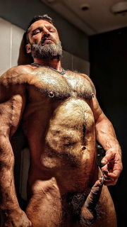 Photo by Nickplus33 with the username @Nickplus33, who is a verified user,  January 19, 2024 at 1:44 AM and the text says '#hairy #daddy #chain #PA #thickbush #balls #beard'