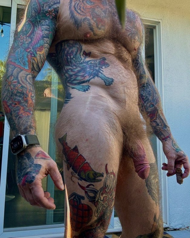 Photo by Nickplus33 with the username @Nickplus33, who is a verified user,  April 23, 2024 at 1:30 AM and the text says '#daddy #hairy #beefy #ink #obsession #beard #thickbush #fatcock #beercandick #massivecock #toned'