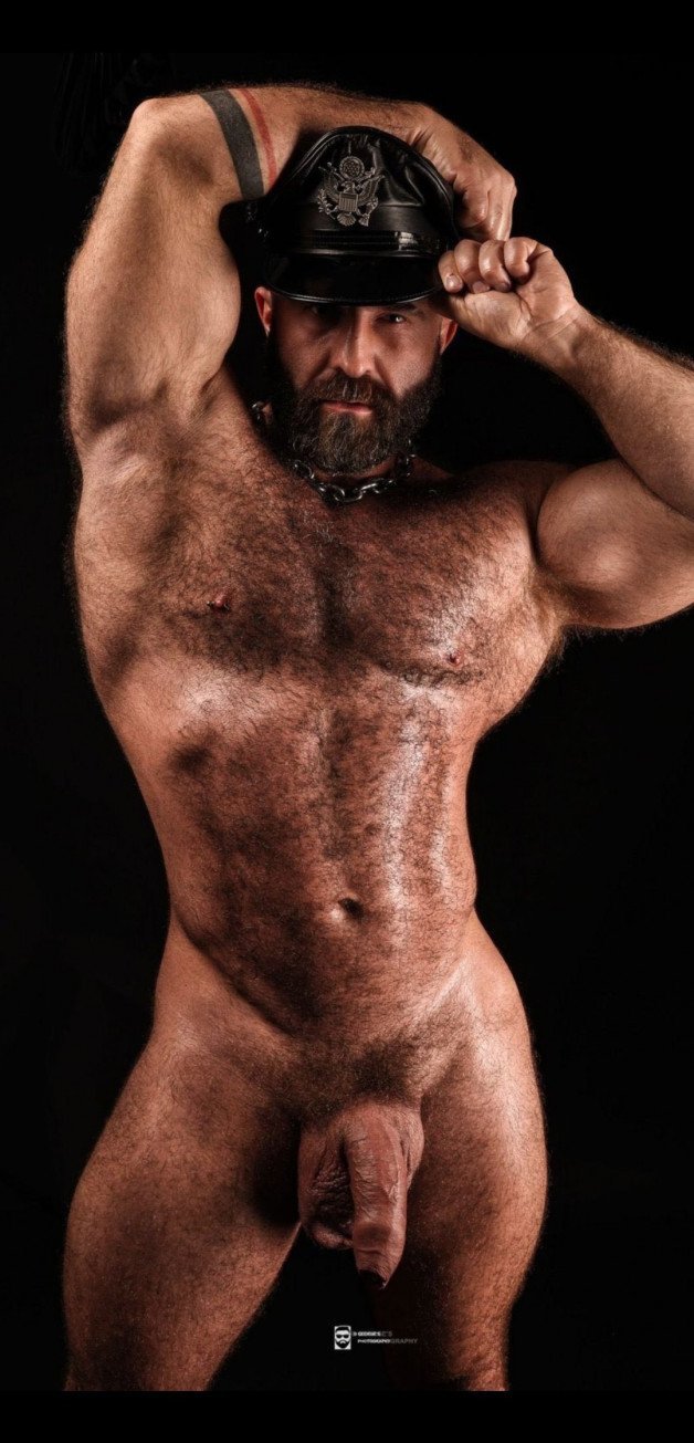 Photo by Nickplus33 with the username @Nickplus33, who is a verified user,  March 14, 2024 at 2:51 AM and the text says '#daddy #muscled #hairy #beefy #hung #thickdick #bush #beard #chain #leather #uncut  #veiny #balls #hotAF'