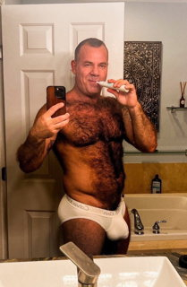 Photo by Nickplus33 with the username @Nickplus33, who is a verified user,  June 28, 2024 at 4:29 AM and the text says '#daddy #bulge #tightywhities #hairy #selfie #toned'