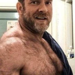 Photo by Nickplus33 with the username @Nickplus33, who is a verified user,  May 4, 2024 at 3:35 AM and the text says '#daddy #scruff  #hairy #beard #muscled #beefy'