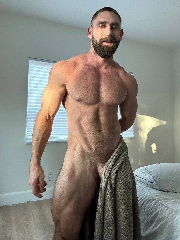 Photo by Nickplus33 with the username @Nickplus33, who is a verified user,  March 13, 2024 at 3:20 AM and the text says '#dilf #muscled #trimmed  #hairy #beard #trimmed  #towel'