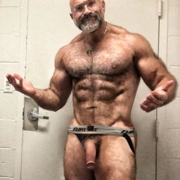 Photo by Nickplus33 with the username @Nickplus33, who is a verified user,  April 6, 2024 at 2:09 AM and the text says '#daddy #muscled #hairy #specs #hung #thickdick #chain #bald'