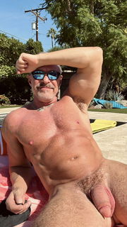 Photo by Nickplus33 with the username @Nickplus33, who is a verified user,  February 23, 2024 at 3:09 AM and the text says '#beard #hairy #trimmed  #chain #manspread  #hung #thickdick #trimmed  #stache #shades #daddy #muscled #outdoors #fatcock'