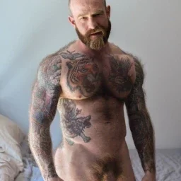 Photo by Nickplus33 with the username @Nickplus33, who is a verified user,  May 7, 2024 at 2:40 AM and the text says '#hairy #hung #massivecock #thickdick #beard #obsession #daddy #dilf #ink #obsession #jackdixon'