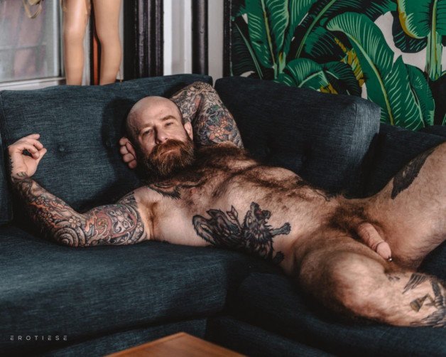 Photo by Nickplus33 with the username @Nickplus33, who is a verified user,  January 19, 2024 at 1:39 AM and the text says '#daddy #jackdixon #beard #hairy #ink #obsession #bald #beefy #bear #thickbush #manspread'