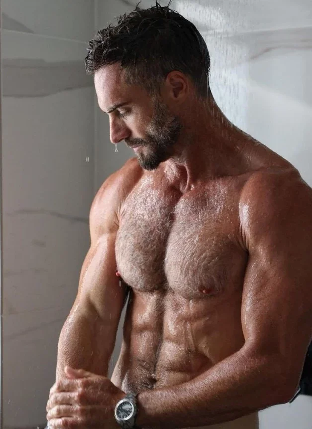 Photo by Nickplus33 with the username @Nickplus33, who is a verified user,  May 10, 2024 at 3:55 AM and the text says '#muscled #hairy #dilf #shower #hairychest #scruff  #beard'