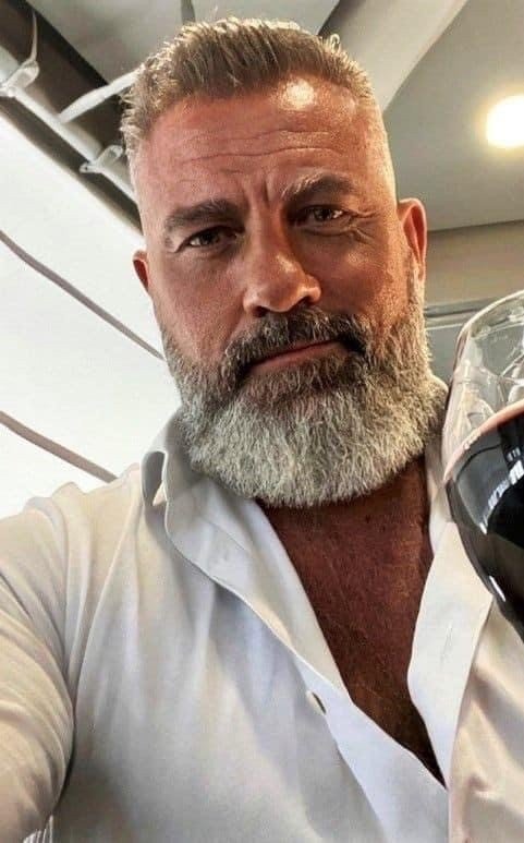 Photo by Nickplus33 with the username @Nickplus33, who is a verified user,  May 26, 2024 at 3:31 AM and the text says '#daddy #beard #beefy'