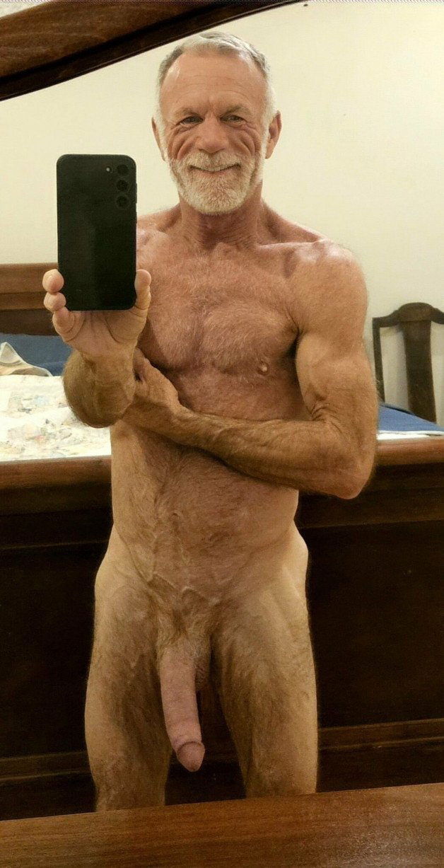 Photo by Nickplus33 with the username @Nickplus33, who is a verified user,  March 3, 2024 at 5:50 AM and the text says '#granddaddy #hung #longdick #beard #selfie #massivecock #monstercock #schlong  #hairy'