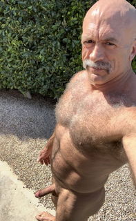 Photo by Nickplus33 with the username @Nickplus33, who is a verified user,  July 13, 2024 at 2:20 AM and the text says '#granddaddy #outdoors #toned #hairy #stache #bald'