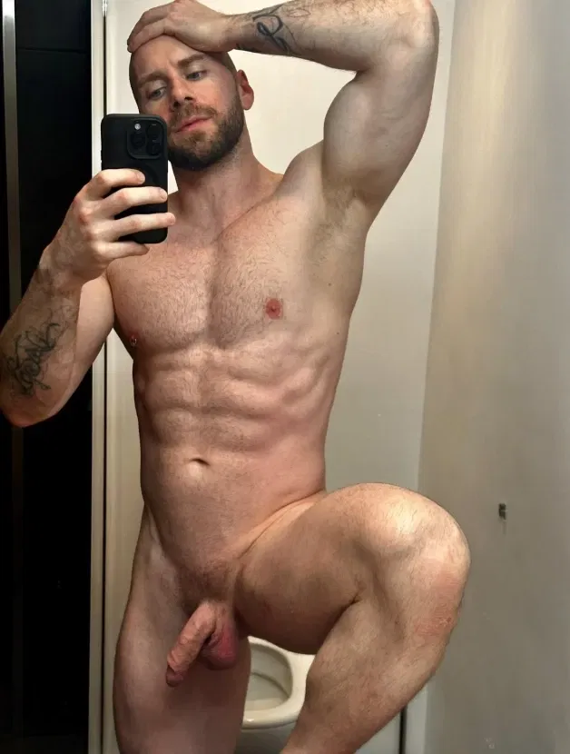 Photo by Nickplus33 with the username @Nickplus33, who is a verified user,  May 9, 2024 at 2:40 AM and the text says '#selfie #muscled #trimmed  #youngdilf #hung #balls #veiny #manspread  #beard'