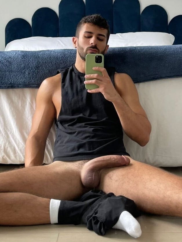 Photo by Nickplus33 with the username @Nickplus33, who is a verified user,  March 23, 2024 at 5:50 AM and the text says '#manspread  #toned #longdick #hung #otter #selfie #balls'