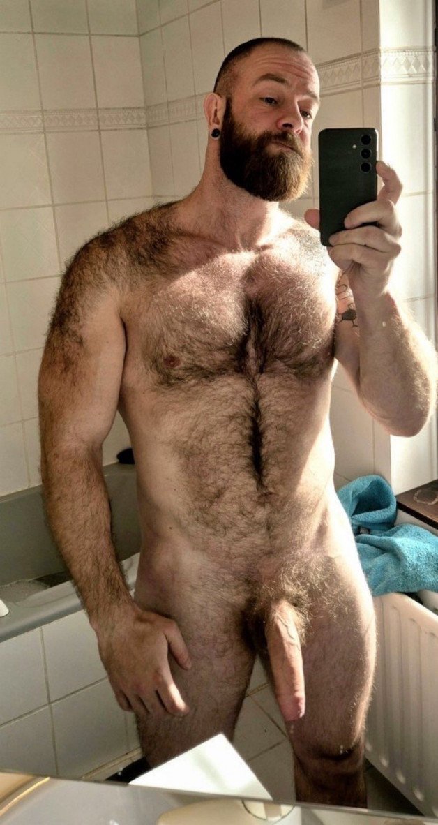 Photo by Nickplus33 with the username @Nickplus33, who is a verified user,  July 3, 2024 at 1:52 AM and the text says '#beard #selfie #hairy #daddy #hung #uncut  #longdick #bear #schlong  #bush'