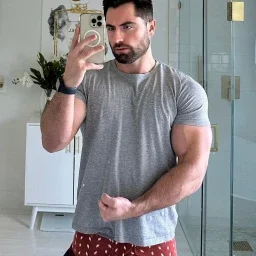 Photo by Nickplus33 with the username @Nickplus33, who is a verified user,  May 6, 2024 at 4:35 AM and the text says '#youngdilf #ruggeryvaldivia #hung #reveal #selfie #manspread  #thickdick #obsession #beard'